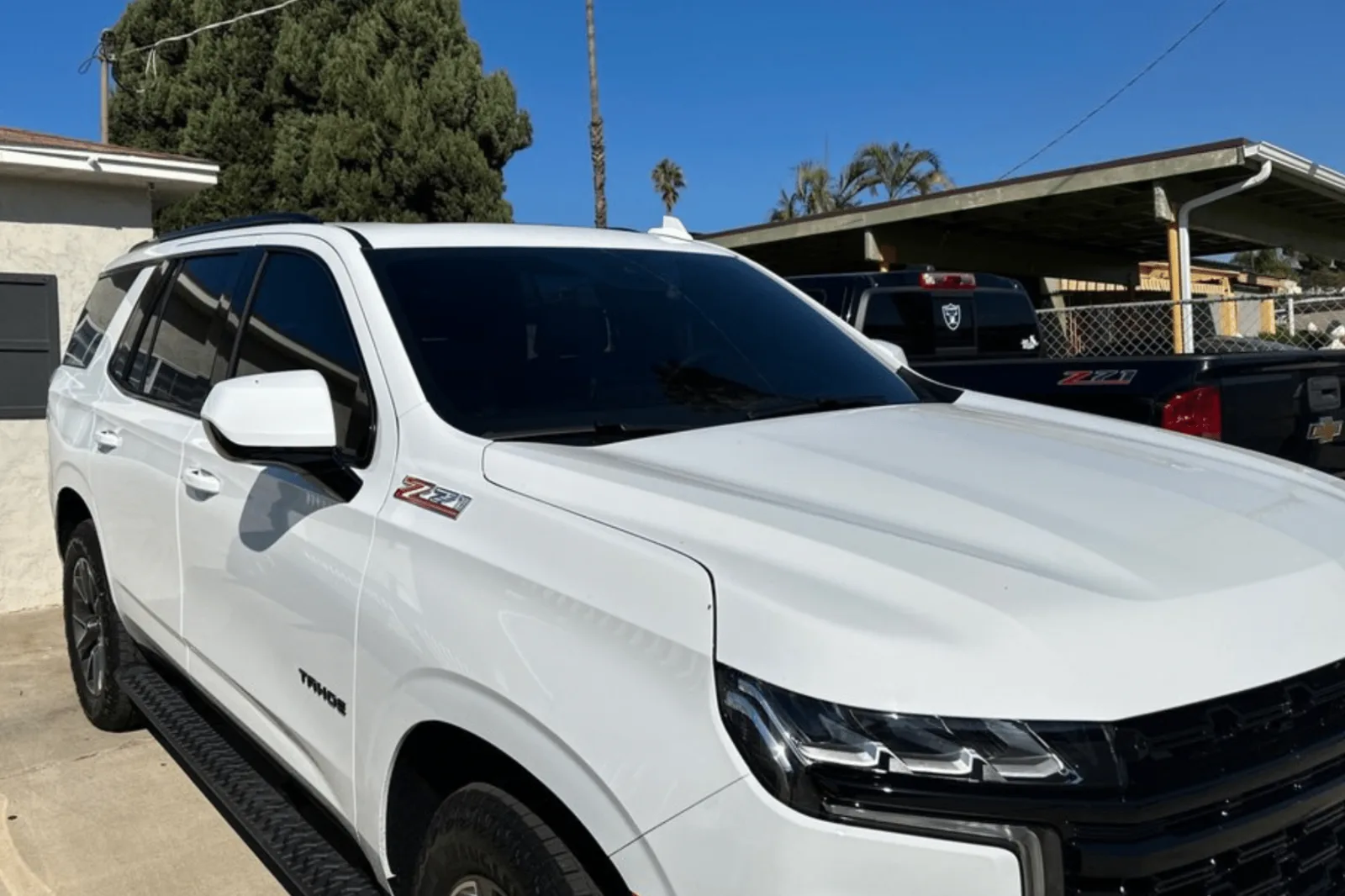 White SUV with dark window tint